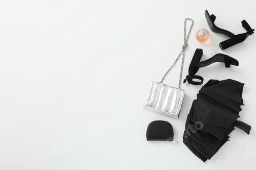 Preview: Stylish female clothes and accessories with umbrella