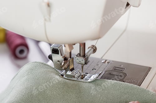 Preview: Sewing machine, stitching fabrics, needle in a round plan