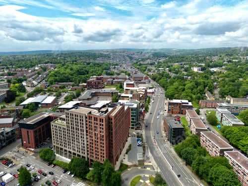 Preview: Beautiful Ecclesall Road with green trees and buildings in Sheffield, England