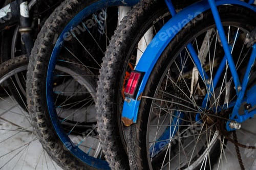Preview: Closeup of old broken bicycles at a repair shop
