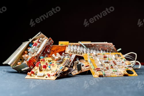 Preview: closeup photo of bunch of computer electric detail on dark background b