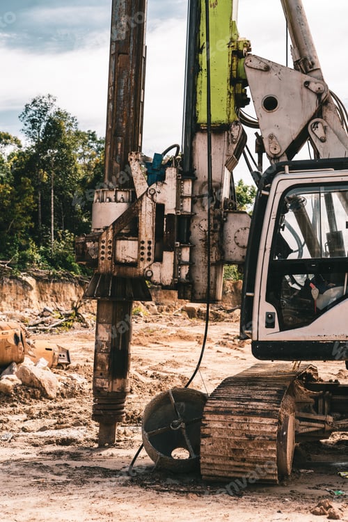 Preview: Vertical shot of a construction site near the forest