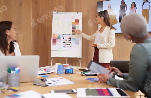 Preview: Lets make the right choice. Shot of a group of female designers working in an office.