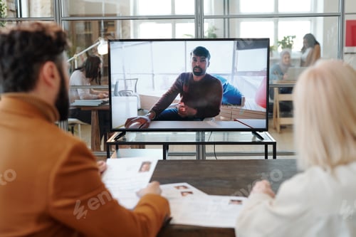 Preview: Two employers asking questions to man during online interview