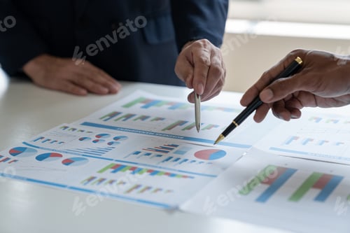 Preview: Asian businessman brainstorming to analyze financial reporting situation, investment, income, tax an