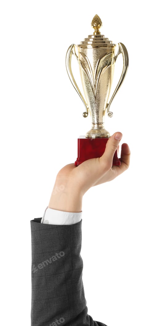Preview: Man with golden trophy cup on white background, closeup