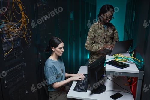 Preview: Two Women Managing Server Network in Data Center