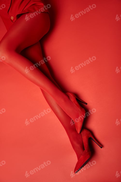 Preview: Scarlet seduction: legs in red stockings and heels