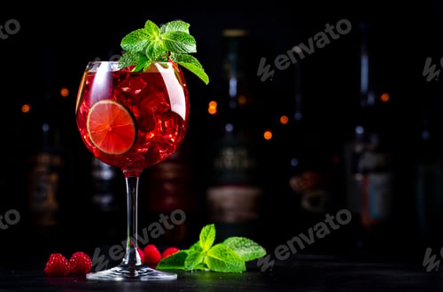 Preview: Raspberry lemonade cocktail drink with tequila, gin, rum, vodka, liquor, lime, fresh raspberries