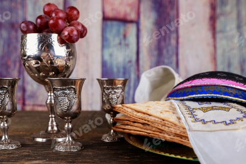 Preview: A Jewish Matzah bread with wine. Passover holiday concept