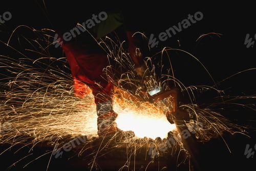 Preview: Anonymous man working with steel