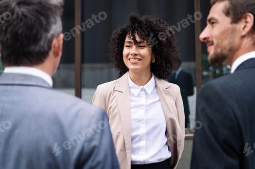 Preview: Business people meeting in a business park