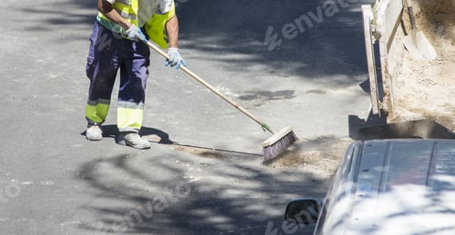 Preview: A group of construction workers are working on a street.
