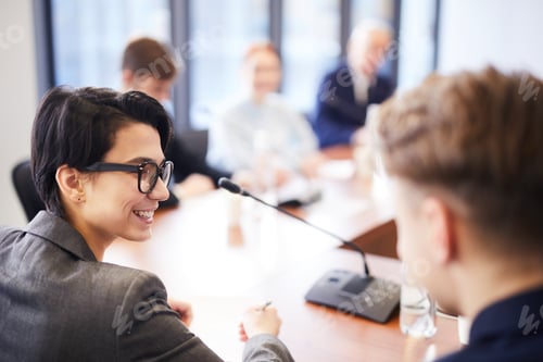 Preview: Smiling Workers in Business Meeting
