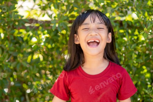 Preview: little girl showing her broken milk teeth