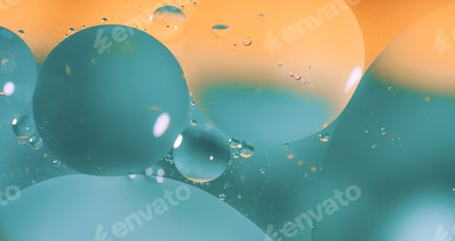 Preview: Cian color Bubbles close-up against blue background