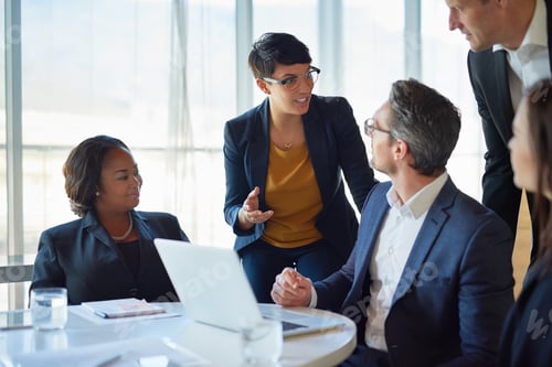 Preview: Shot of a group of corporate businesspeople working in the boardroom