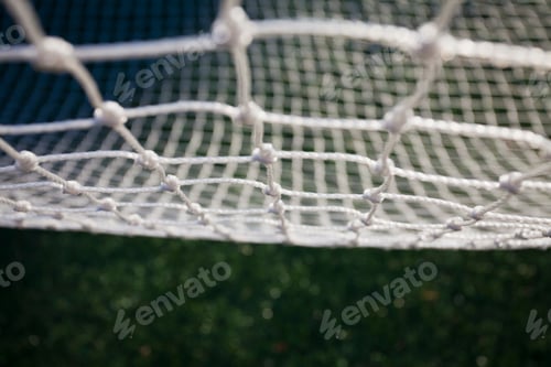 Preview: Close up of a white mesh, fishing net.