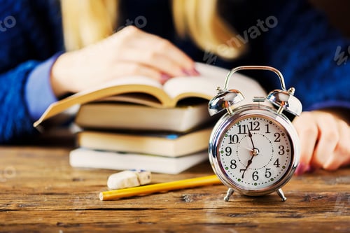 Preview: Stydying concept: student preparing late for his exams
