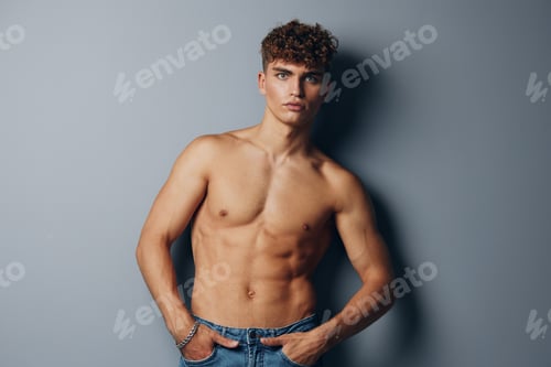 Preview: man attractive muscular guy chest gray background bodybuilder care sport standing