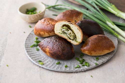 Preview: Russian pastries (pirogi) filled with eggs and green onion