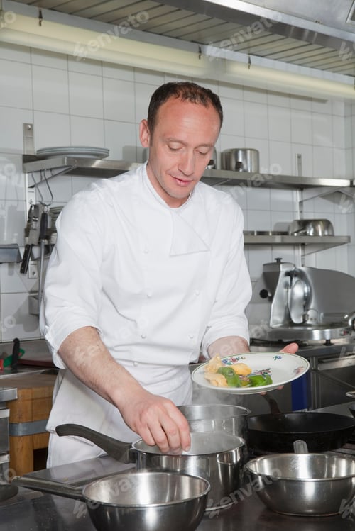 Preview: cook putting pasta into boiling water