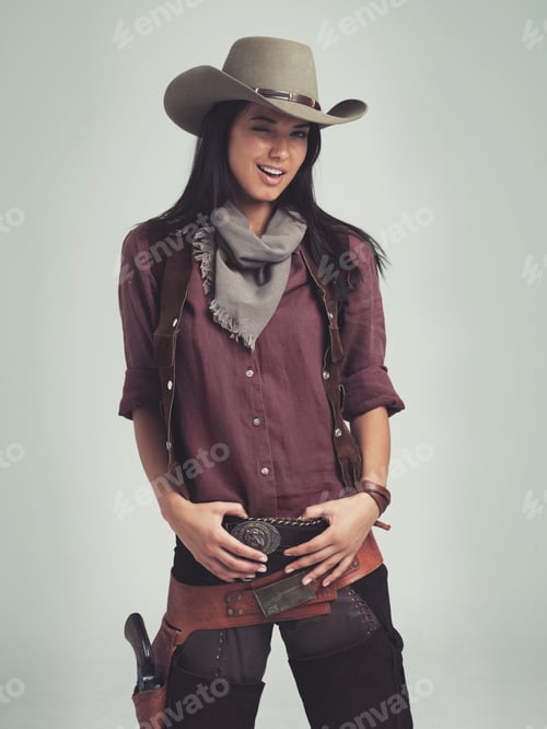 Preview: Hey cowboy...Cropped shot of an attractive young woman in cowboy attire.