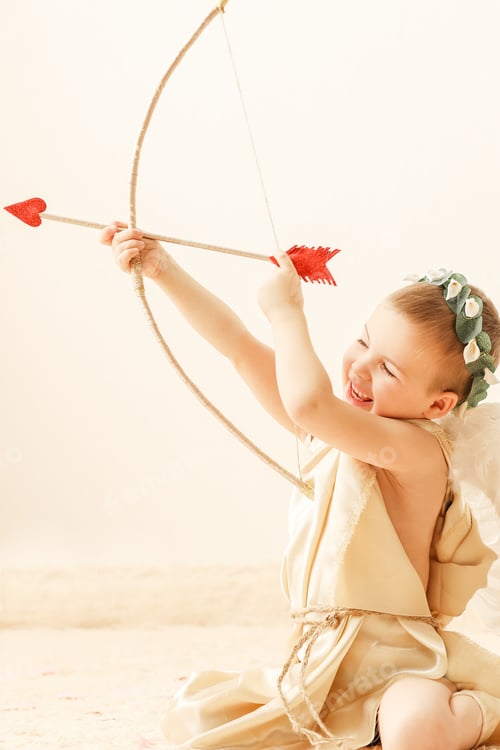 Preview: A little boy in a cupid costume