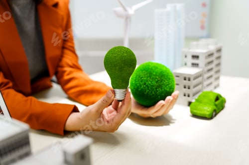 Preview: A businesswoman in a brown suit stands at a white desk with a world model, net zero 2050 reduce co2