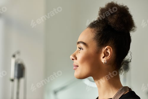 Preview: Woman Profile with Natural Hair in Updo Style
