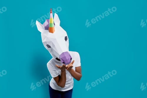 Preview: Female posing with colorful 3d papercraft in form of unicorn