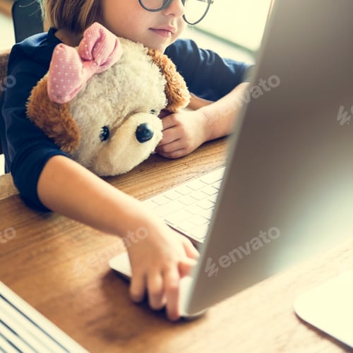 Preview: Little Girl Using Computer Concept