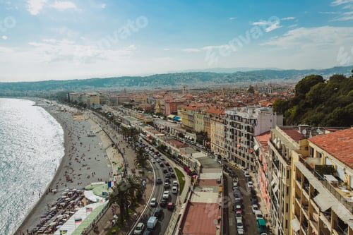 Preview: Panoramic view of Nice coastline and beach with blue sky, France