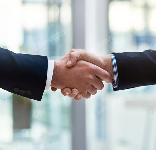 Preview: Pairing up with a trustworthy business associate. Cropped shot of two businessmen shaking hands.