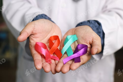 Preview: Cupped Hands Professional Doctor Showing Colorful Ribbons On Palms
