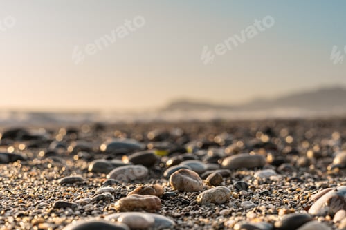 Preview: Close up stone background with blurred sky on the horizon
