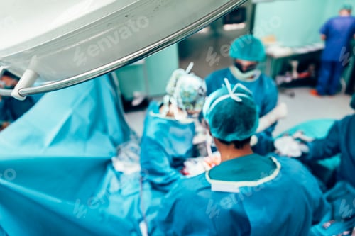 Preview: Team of Surgeons Operating.