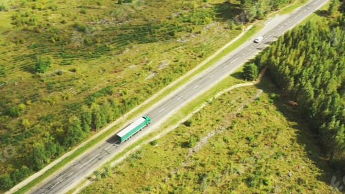 Preview: Aerial View Of Highway Road Through Field And Summer Green Forest Landscape. Top View Of Truck