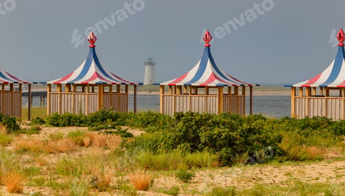 Preview: Scenic view of small beach cabanas on the Marthas vineyard surrounded by grass