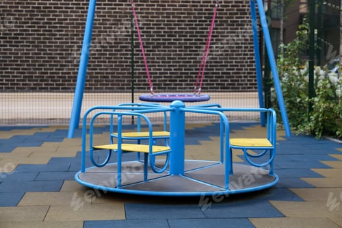 Preview: Colourful carousel for children on outdoor playground