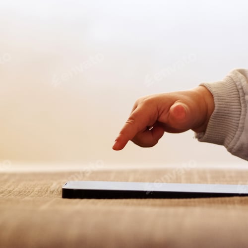 Preview: Baby pressing with finger on phone touch screen, close-up and soft focus. Child pressing, scrolling