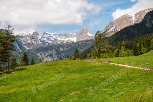 Preview: Summer in the mountains which are still covered with snow