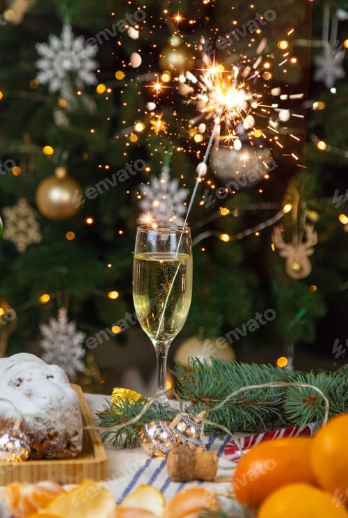 Preview: Champagne on the Christmas table. Selective focus.