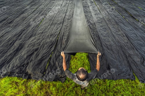 Preview: Top view vietnamese worker dry clothes in the sun when sunrise in tan chau village
