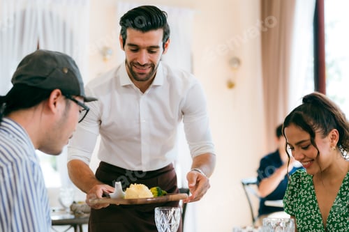 Preview: Waitress man serving food to group of diverse customer in restaurant, eatery client woman