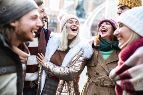 Preview: Young people wearing winter clothes having fun on city street