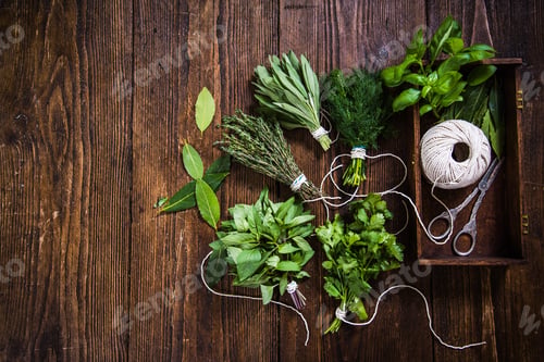 Preview: drying fresh herbs on wooden table
