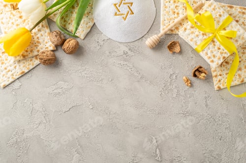 Preview: Elegant Seder night layout photographed from top view, including ribbon-adorned matzah, walnuts