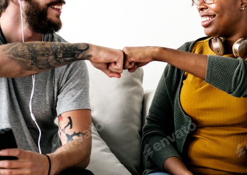 Preview: Musician couple fist bumping