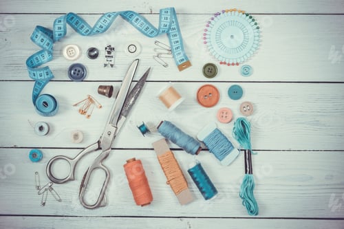Preview: Old scissors, buttons, threads, measuring tape and sewing suppli